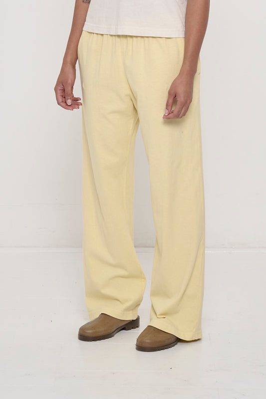 3/4 front waist down of a 5'8" person in Size M. Hem at bottom of the heels.