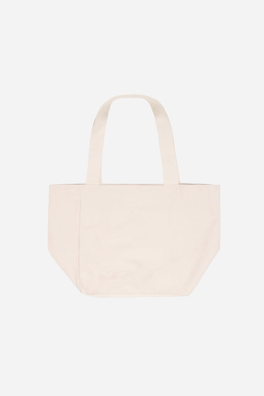 Flat lay of Big Tote in Natural, showing depth, stitching, and web straps.