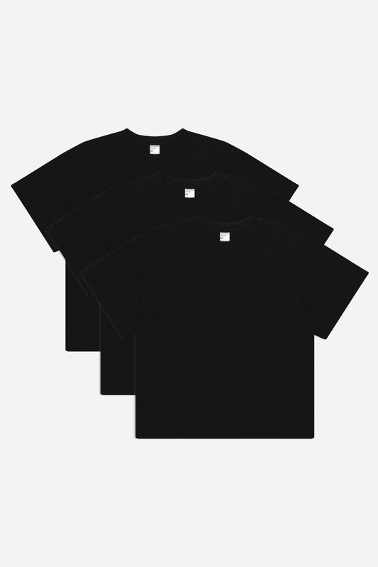 Flat lay of 3 slightly offset Black Boxier Trash Tees.