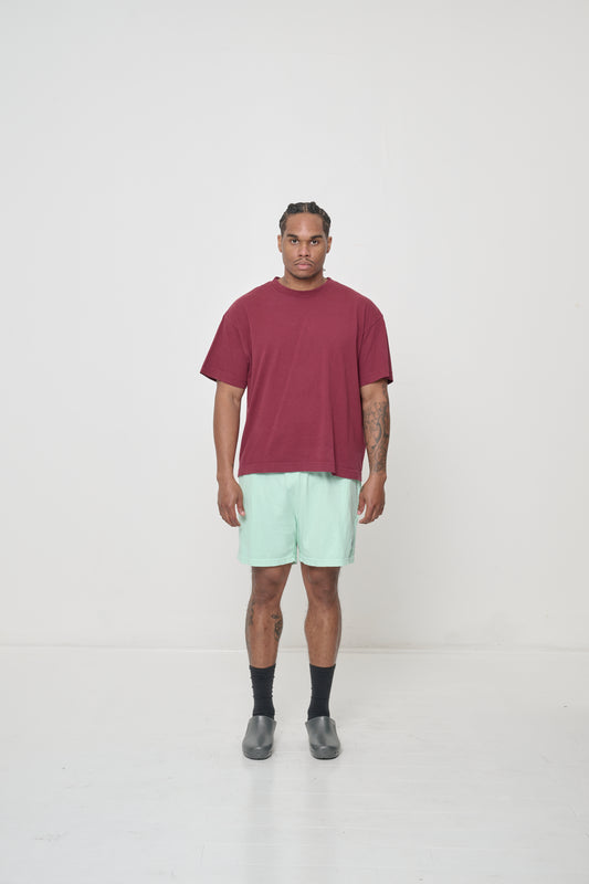 Boxier Trash Tee in Burgundy on model