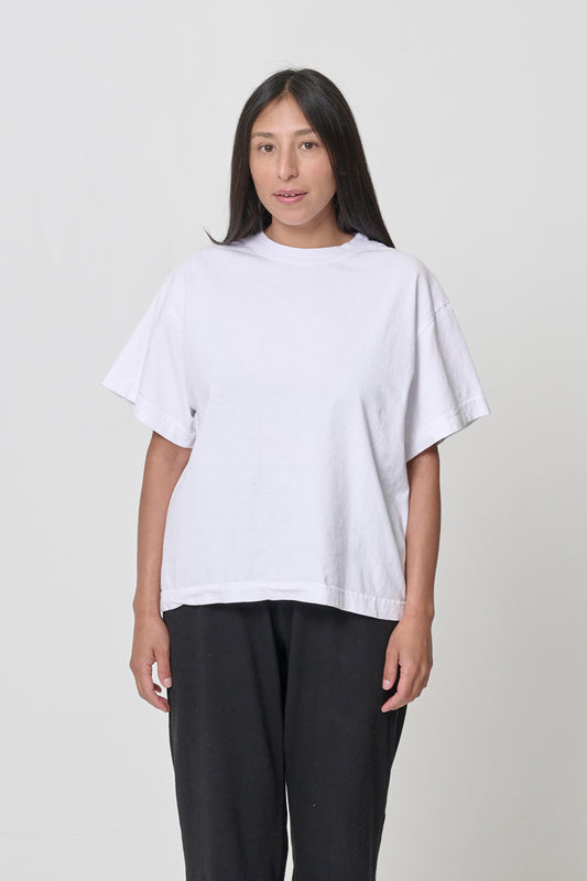 Front view of a 5'4" woman wearing White Boxier Trash Tee in size S. Bottom hem cropped to the lower hip.