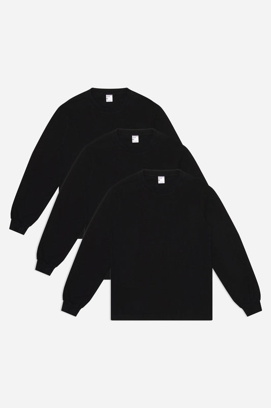 Flat lay of 3 slightly offset Black Long Sleeve Trash Tees.