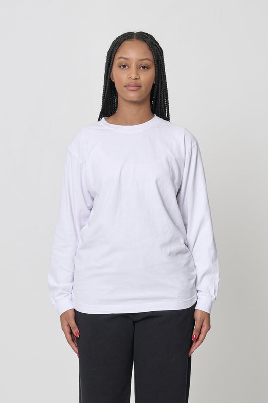 5'10" woman in a size M White Long Sleeve Trash Tee; shirt hem at lower-middle hip, arms at her sides.