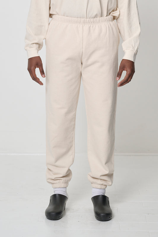 Front view: 6'2" person in size L Scour Trash Sweatpants, relaxed fit with slight bunching at the ankles.