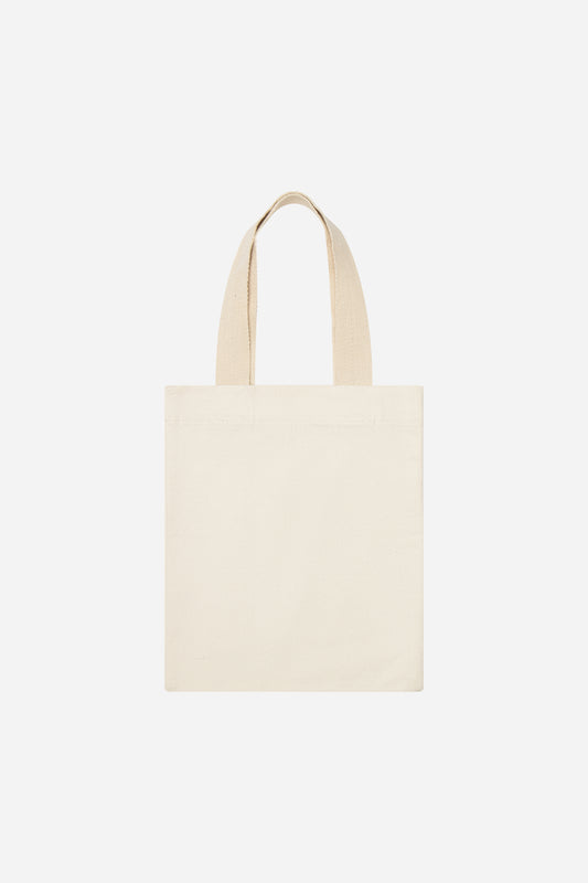Flat lay of Classic Tote in Natural, showing stitching and web straps.