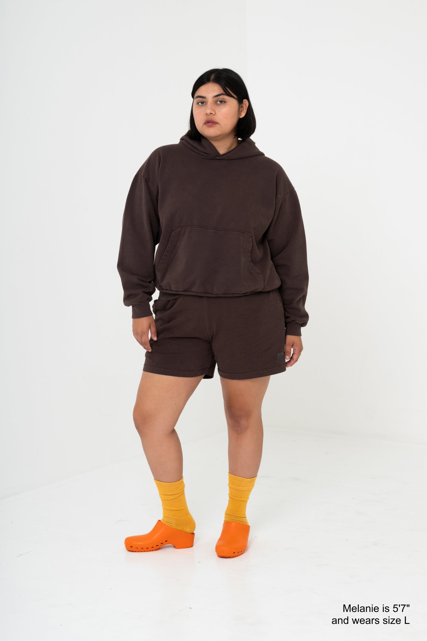 Styled with a matching Trash Hoodie.