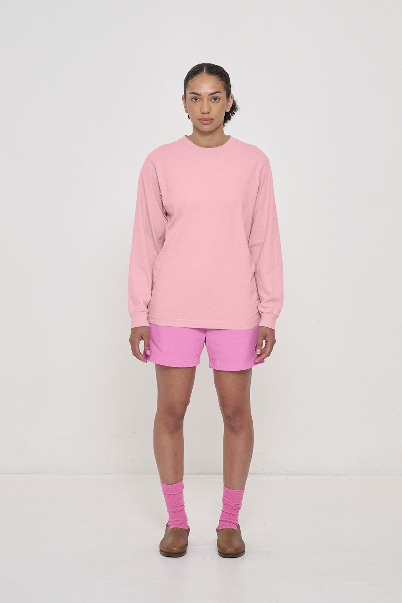 A 5'8" woman in an XS Long Sleeve Trash Tee. Hem at lower hip. 