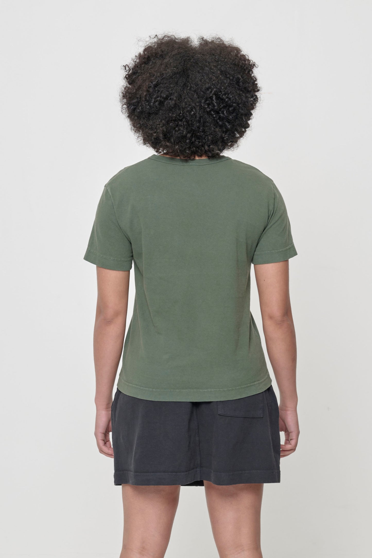 Back view: fitted across upper back and relaxed at middle and lower back.