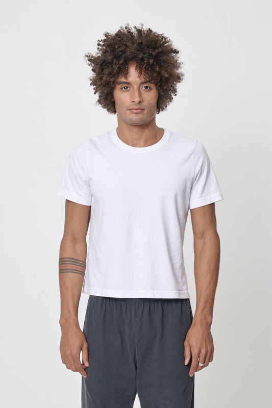 6' man wearing White Tailored Trash Tee in Size L, shirt hem hits his upper hip.